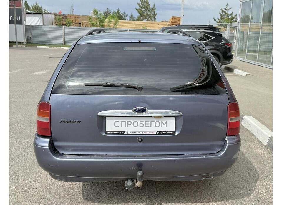 Ford Mondeo, II 1.6 MT (90 л.с.)