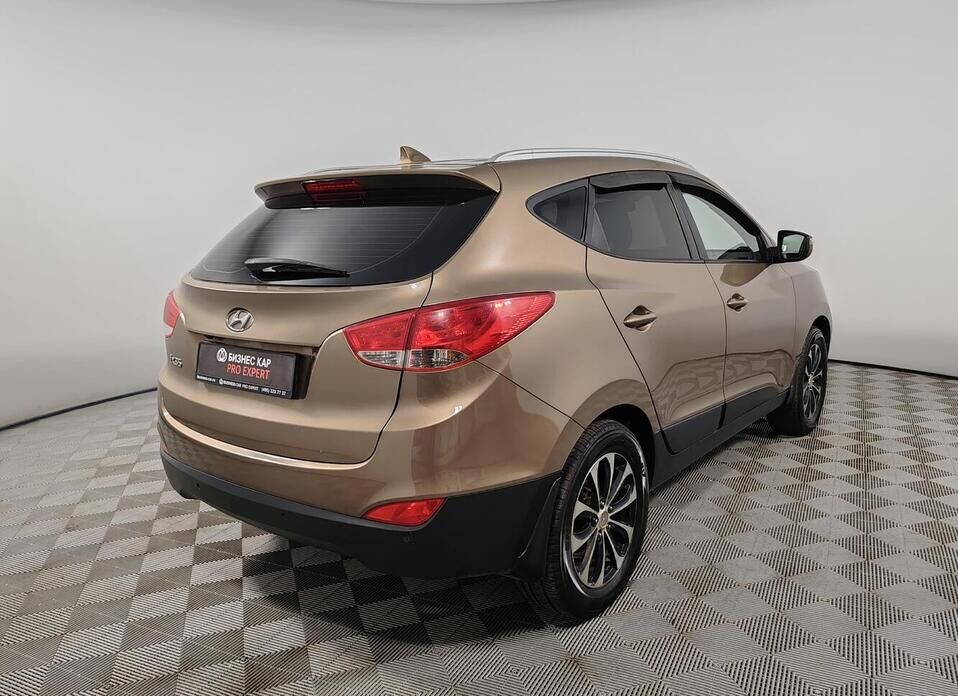 Hyundai ix35, I Рестайлинг 2.0 AT (150 л.с.)