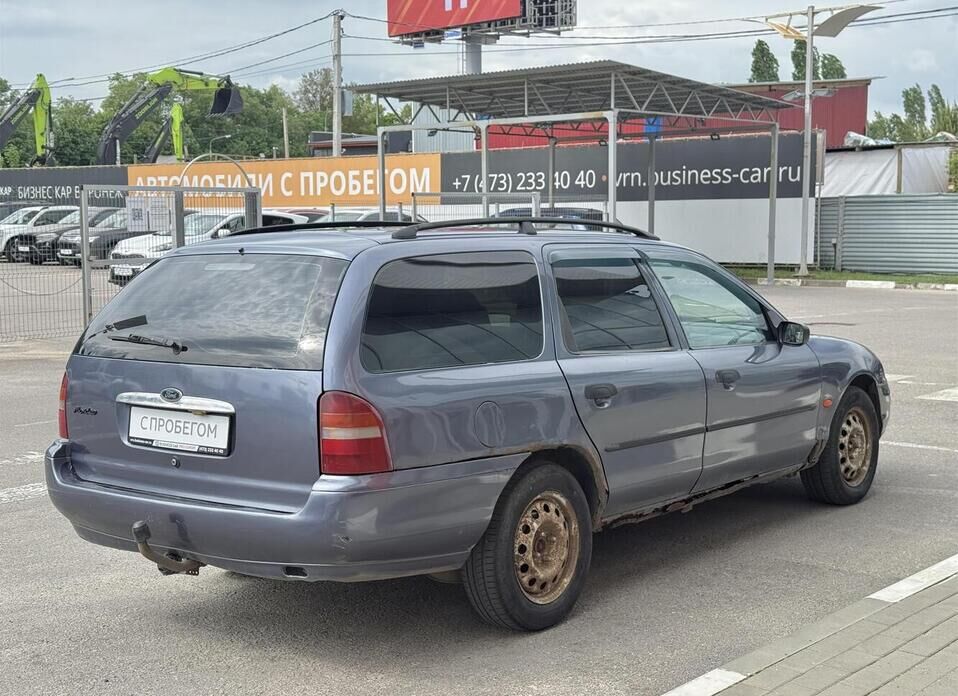 Ford Mondeo, II 1.6 MT (90 л.с.)