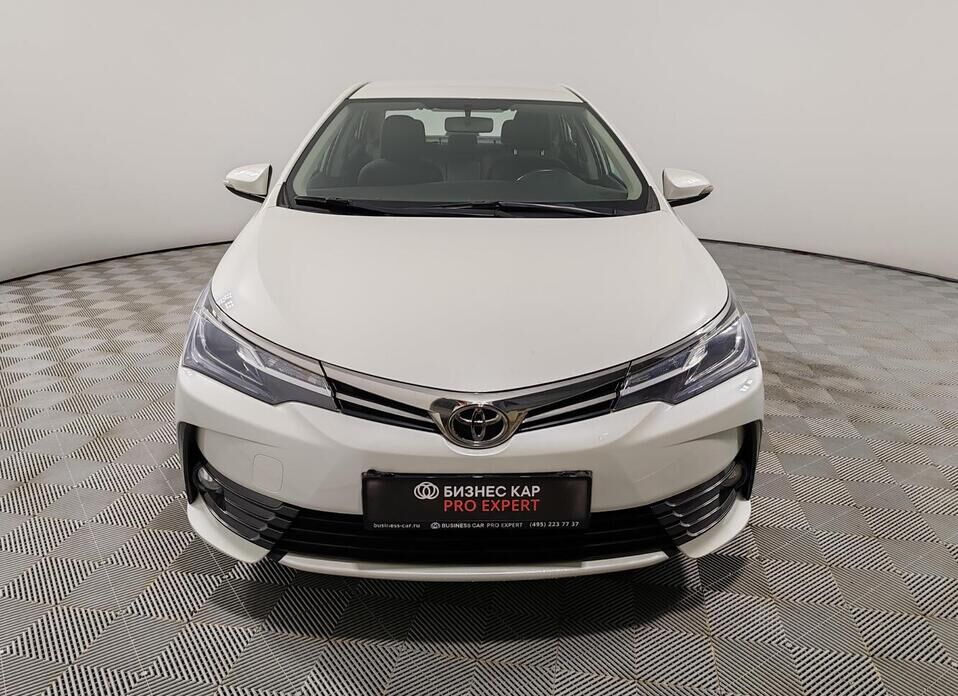 Toyota Corolla, XI (E160, E170) Рестайлинг 1.6 CVT (122 л.с.)